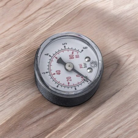 Pressure Gauge on a wooden table